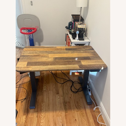 Used Vari Electric Standing Desk with ComfortEdge for sale on AptDeco