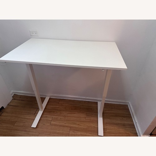 Used IKEA Trotten Desk Sit/Stand for sale on AptDeco