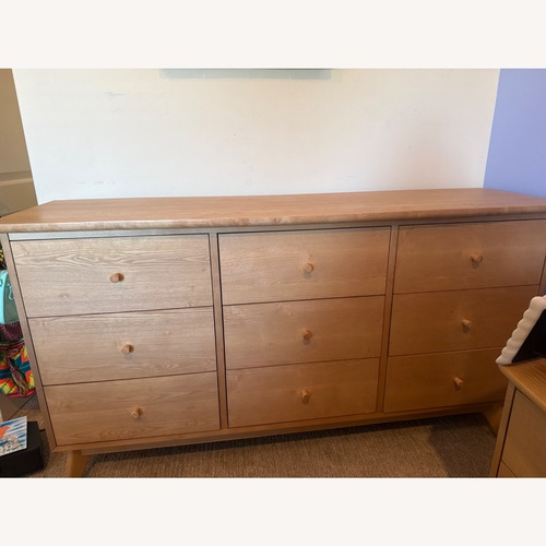 Used Living Spaces Light Brown Wood Dresser for sale on AptDeco
