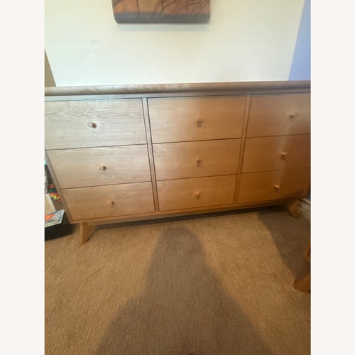 Used Living Spaces Light Brown Wood Dresser for sale on AptDeco