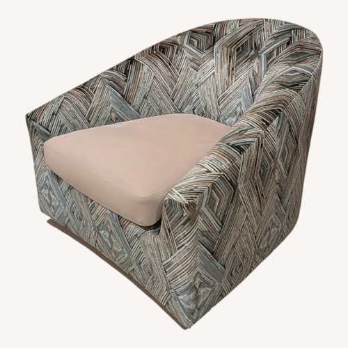 Used Minotti Fabric & Leather Swivel Accent Chairs for sale on AptDeco