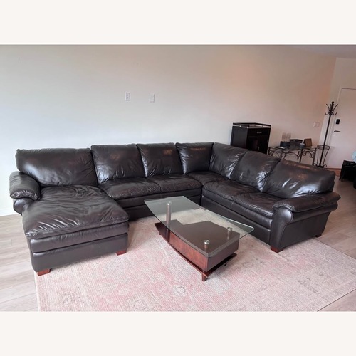 Used Dark Brown Leather Sectional Sofa with Chaise for sale on AptDeco