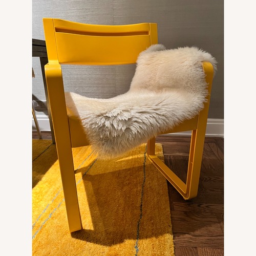 Used Postmodern 70sYellow Plastic Chair for sale on AptDeco