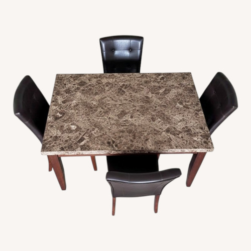 Used Faux Marble Dining Table Set with 4 Chairs for sale on AptDeco