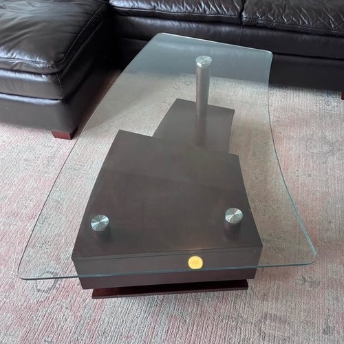 Used Dark Brown Glass Coffee Table for sale on AptDeco