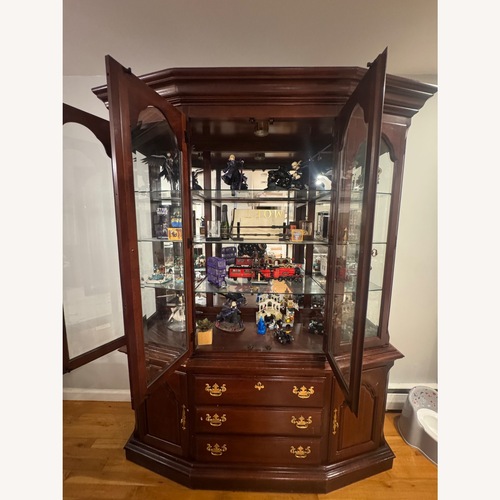 Used Vintage/Antique Finds Dark Brown Wood Wall Unit for sale on AptDeco