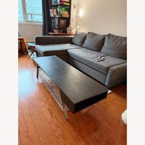 Used IKEA Black Wood Coffee Table for sale on AptDeco