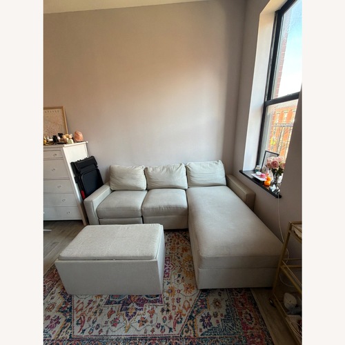 Used Beige Storage Sofa with Recliner and Ottoman for sale on AptDeco