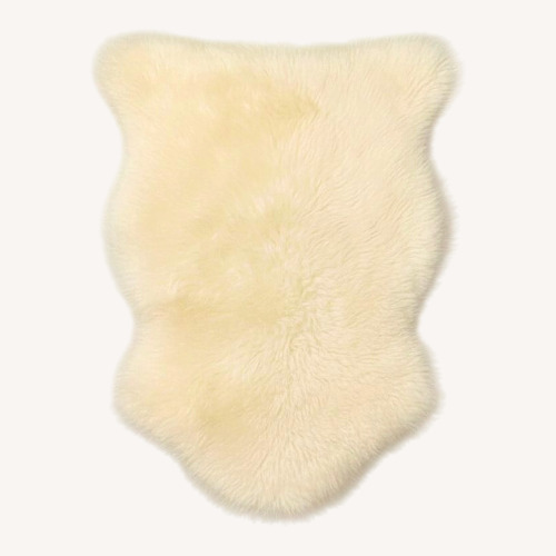 Used Genuine Sheepskin Rug Ivory White, 2 x 3 ft for sale on AptDeco