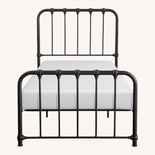Used Raymour & Flanigan Black Metal Twin Beds for sale on AptDeco