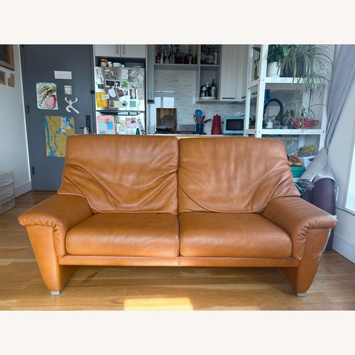 Used Light Brown Leather Loveseat for sale on AptDeco