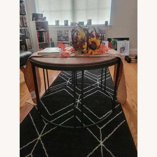 Used Coffee Table with Steel Base and Wood Top for sale on AptDeco