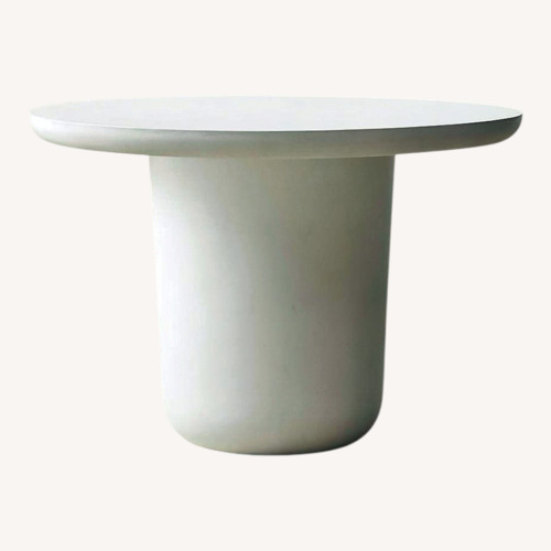 Used CB2 Lola 45" Round Ivory Concrete Dining Table for sale on AptDeco