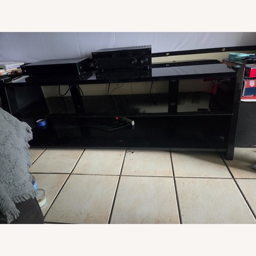 Used Black Glass Media Storage for sale on AptDeco