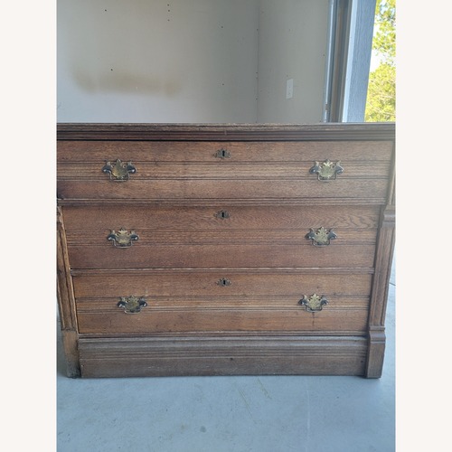 Used Vintage/Antique Finds Dark Brown Wood Dresser for sale on AptDeco