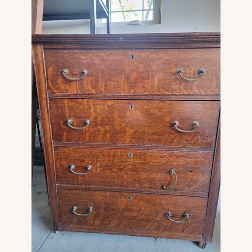 Used Vintage/Antique Finds Dark Brown Wood Dresser for sale on AptDeco