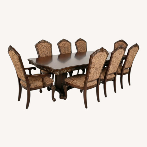 Used Dark Brown Wood Dining Table and Chairs for sale on AptDeco