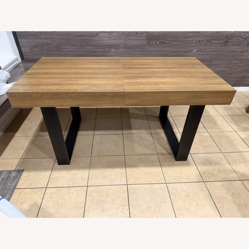 Used Yufam Light Brown Wood Dining Table for sale on AptDeco