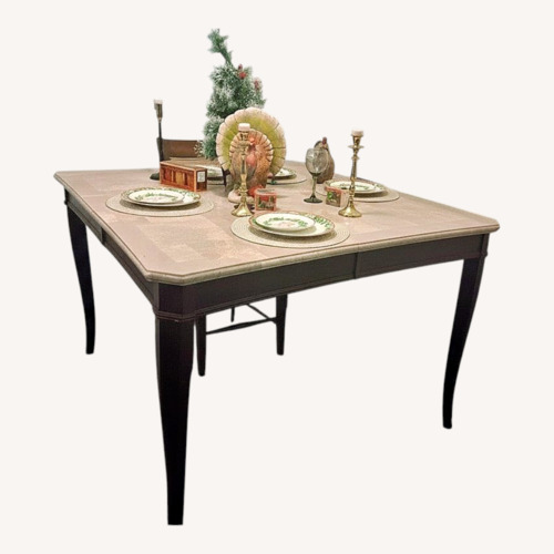 Used Dark Brown Wood Dining Table for sale on AptDeco