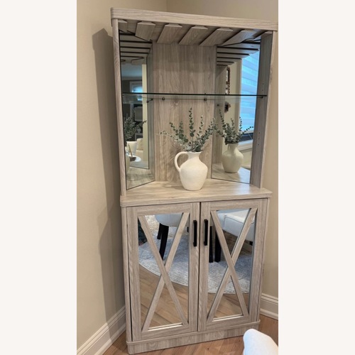 Used Modern Light Oak Corner Bar Cabinet for sale on AptDeco