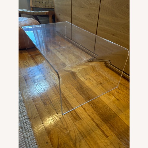 Used CB2 Transparent Coffee Table for sale on AptDeco