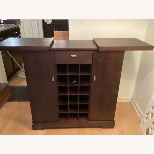 Used Crate & Barrel Spirits Dark Brown Wood Bar Cart for sale on AptDeco