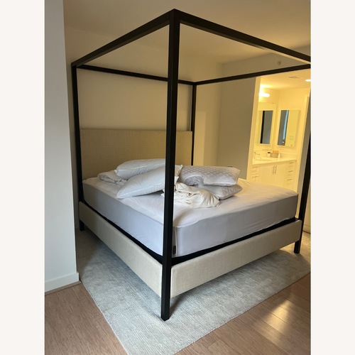 Used Pottery Barn Black Atwell Canopy Metal King Bed for sale on AptDeco