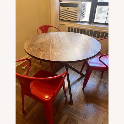 Used CB2 Twist Bistro Dining Table for sale on AptDeco