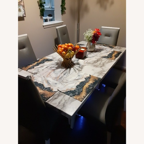 Used Marble Look Dining Table with 6 Chairs for sale on AptDeco