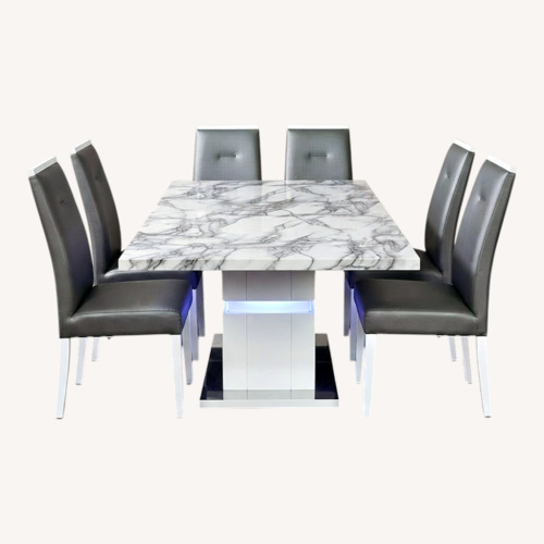 Used Marble Look Dining Table with 6 Chairs for sale on AptDeco