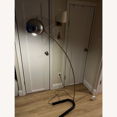 Used Vintage 1970s Space-Age Chrome Arc Floor Lamp for sale on AptDeco