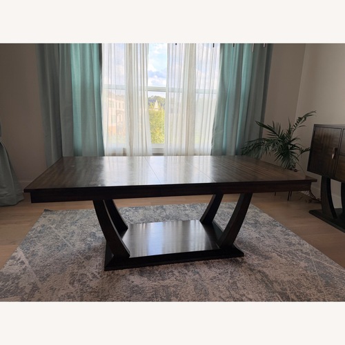 Used Costsco Dark Brown Wood Dining Table for sale on AptDeco