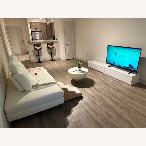Used Modani White Leather 2 Piece Sectional for sale on AptDeco