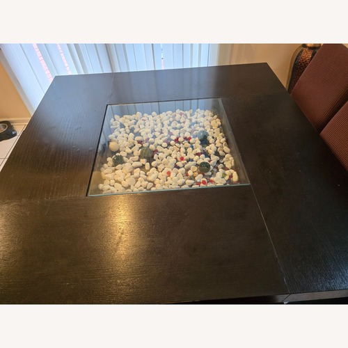 Used Raymour & Flanigan Dark Brown Wood Dining Set for sale on AptDeco