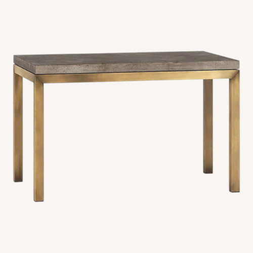 Used Crate & Barrel Parsons Concrete and Brass Dining Table for sale on AptDeco