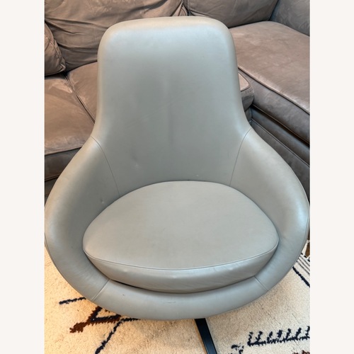 Used Noomi Light Gray Leather Accent Chair and Ottoman for sale on AptDeco