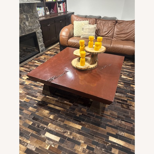 Used Dark Brown Wood Coffee Table for sale on AptDeco