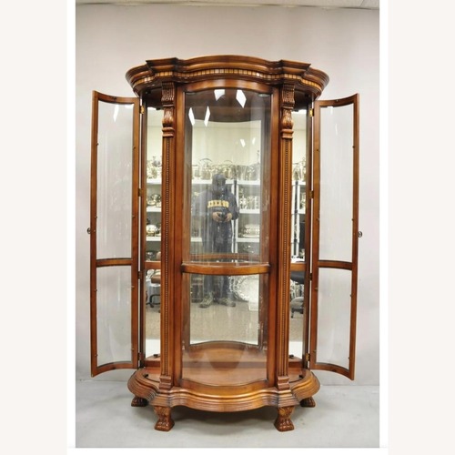 Used Curved Glass Curio With Lightning for sale on AptDeco
