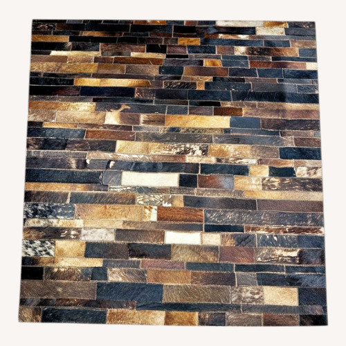 Used Cowhide Patchwork Rug  for sale on AptDeco