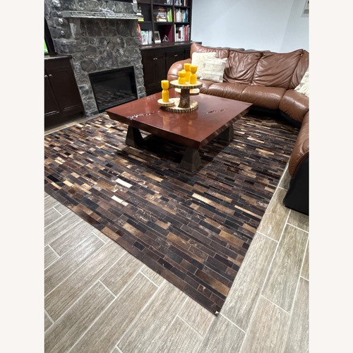 Used Cowhide Patchwork Rug  for sale on AptDeco