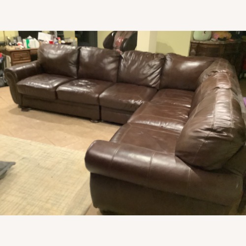 Used Peter Andrews Dark Brown Leather Sectional for sale on AptDeco