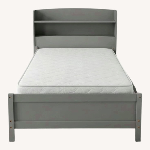 Used Kids Twin Bed With Shelves for sale on AptDeco