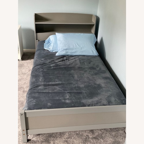 Used Kids Twin Bed With Shelves for sale on AptDeco