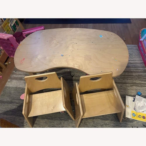 Used Light Brown Wood Play Table for sale on AptDeco