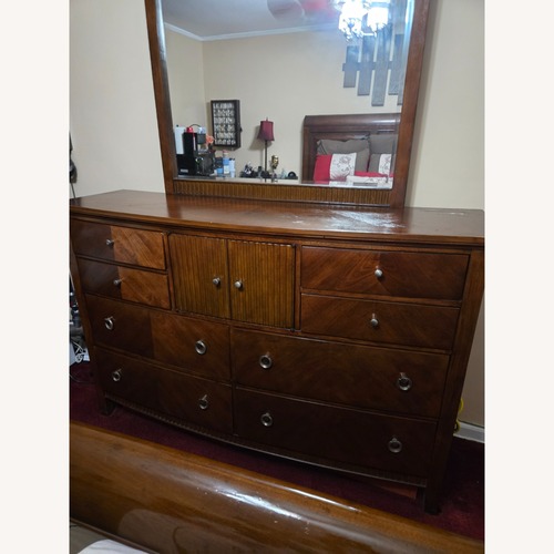 Used Ashley Furniture Dark Brown Wood Dresser for sale on AptDeco