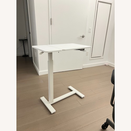 Used Overbed Tilting Bedside Table,Desk with Wheels for sale on AptDeco