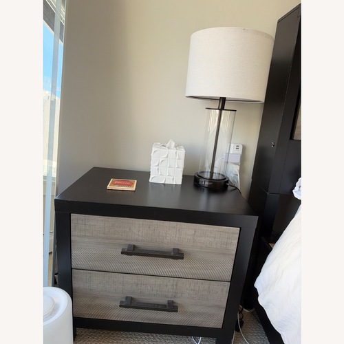 Used Bob's Discount Furniture Fusion Black Wood Nightstand for sale on AptDeco