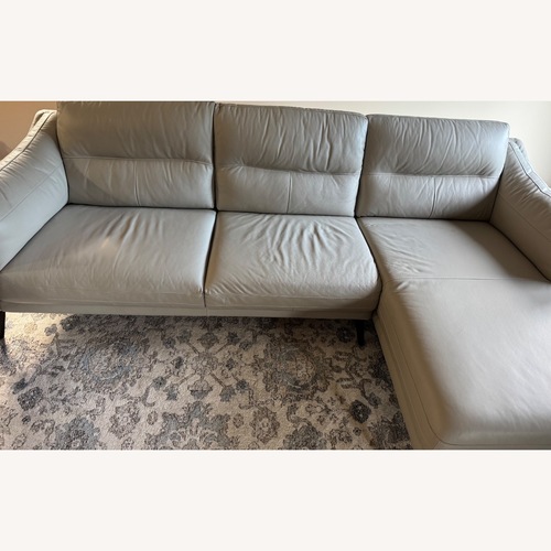 Used Stylish Gray Leather Sectional for sale on AptDeco