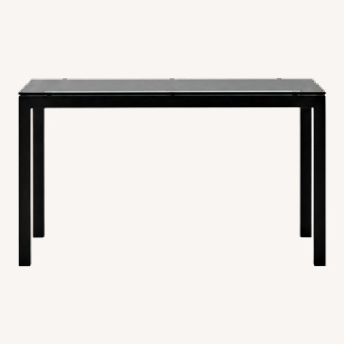 Used West Elm Black Glass Dining Table for sale on AptDeco