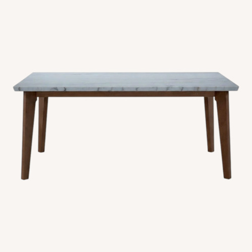 Used Elm Natural & Marble Dining Table for sale on AptDeco